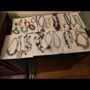 Multiple kinds of eclectic jewelry.